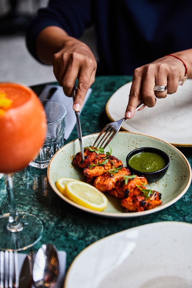 Grilled skewers with herb sauce.